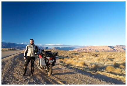 Standing by my old motorcycle along the road in southern Utah